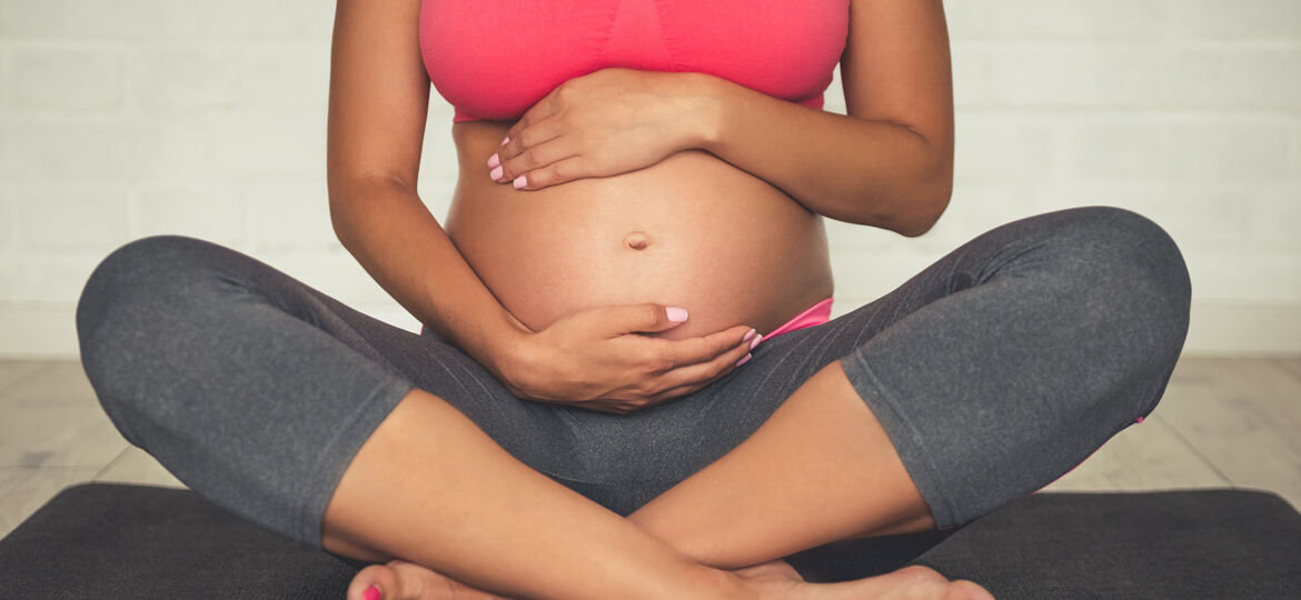 Pregnant woman doing yoga