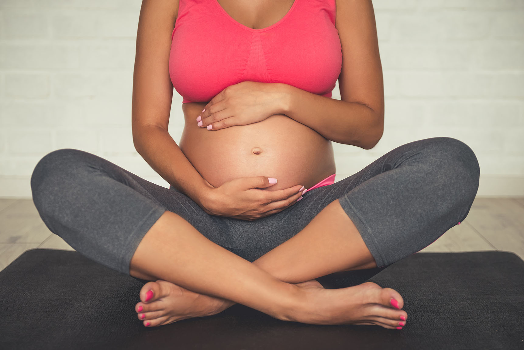 Pregnant woman doing yoga